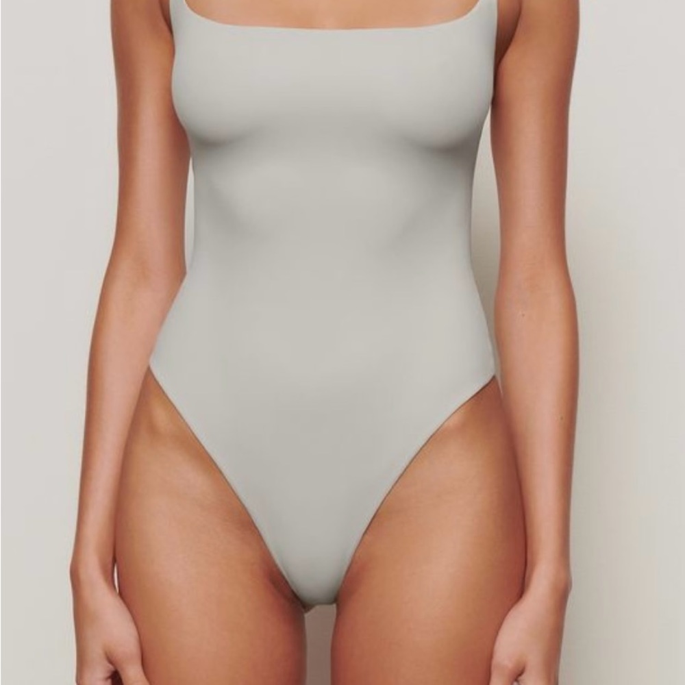 Skims, square neck “fits everybody” thong bodysuit in talc